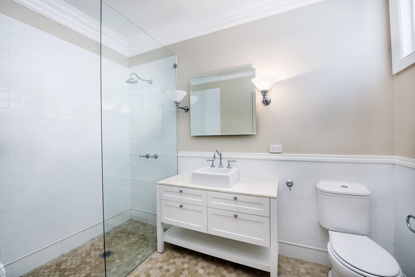 Balgowlah Heights, bathroom with glass shower, white vanity, mirror and subway-tiled walls, built by HP Constructions with All Australian Architecture