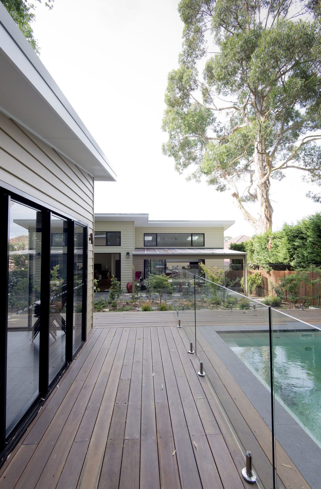 Balgowlah, timber pool deck with glass balustrade and glazed contemporary extension, built by HP Constructions with Scope Architects