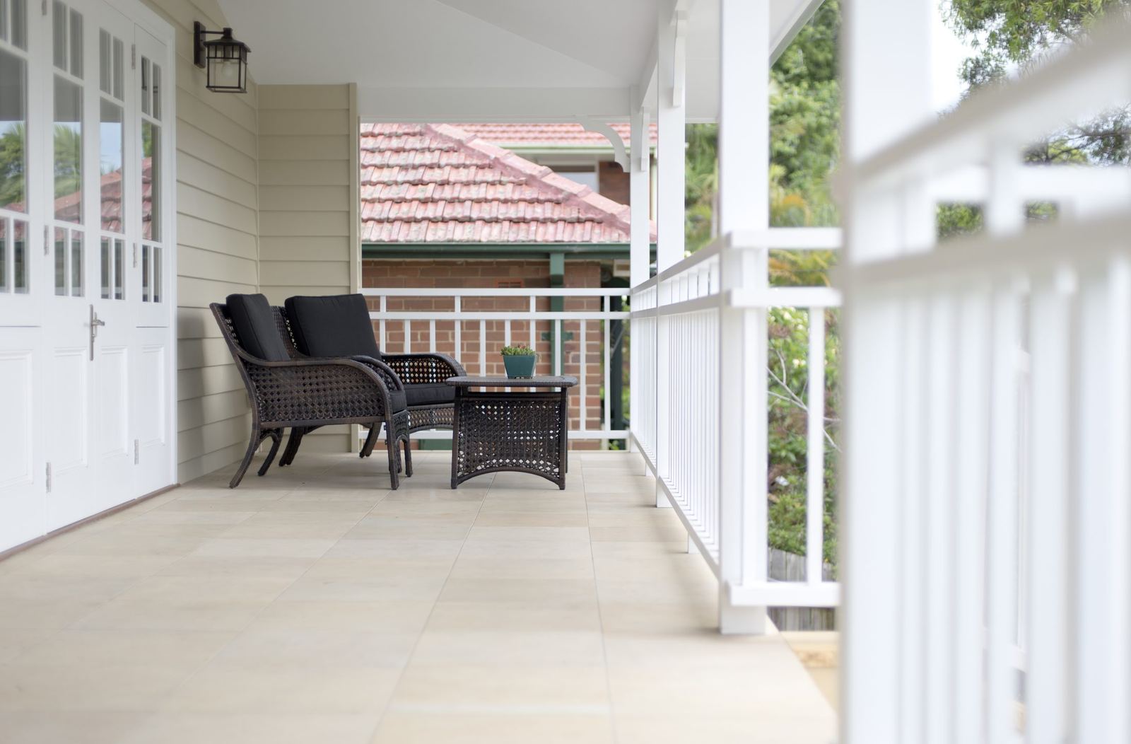 Balgowlah, covered veranda with white timber doors, tiled floor and outdoor seating, built by HP Constructions with Scope Architects