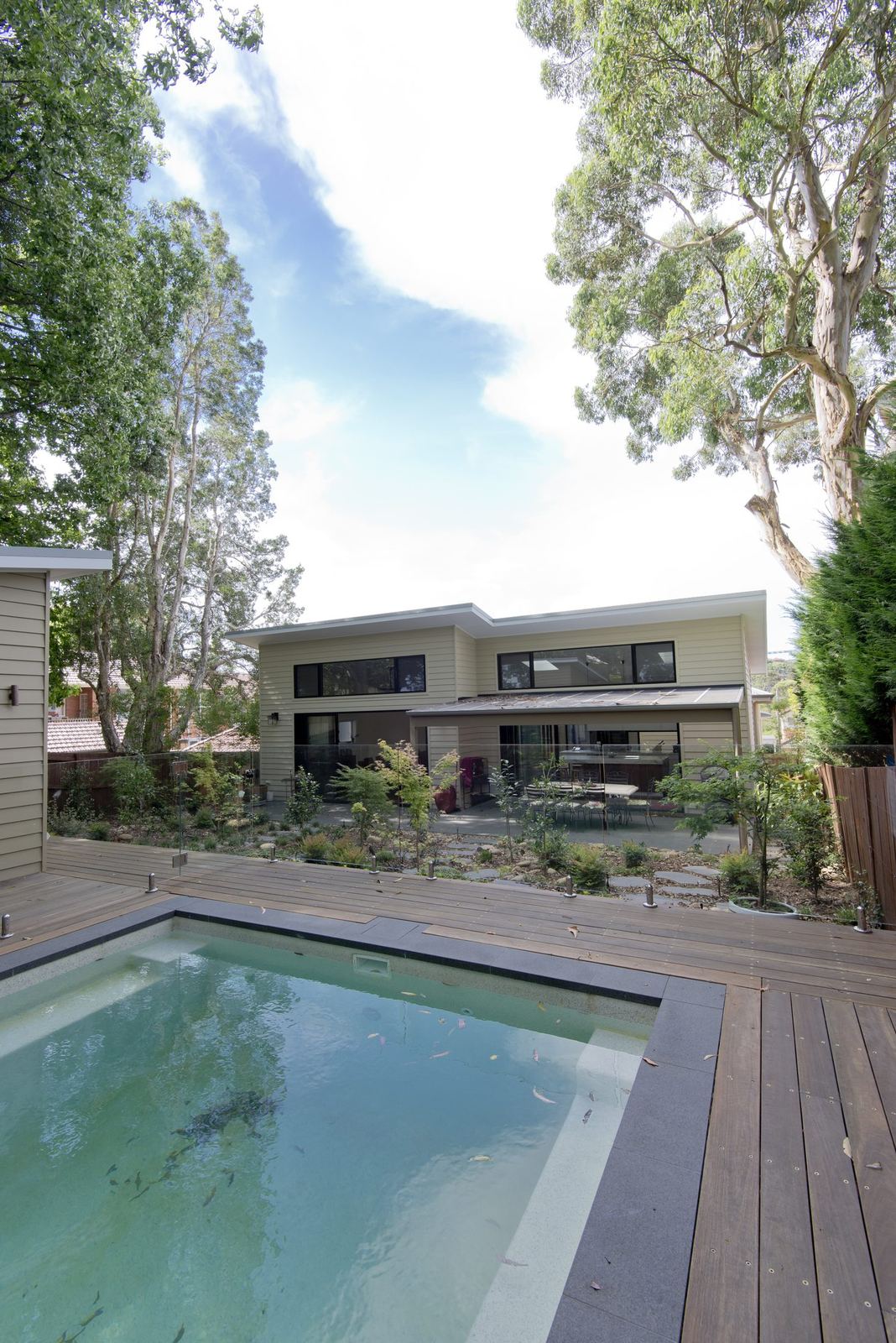 Balgowlah, concrete pool beside a timber deck and the contemporary rear extension, built by HP Constructions with Scope Architects