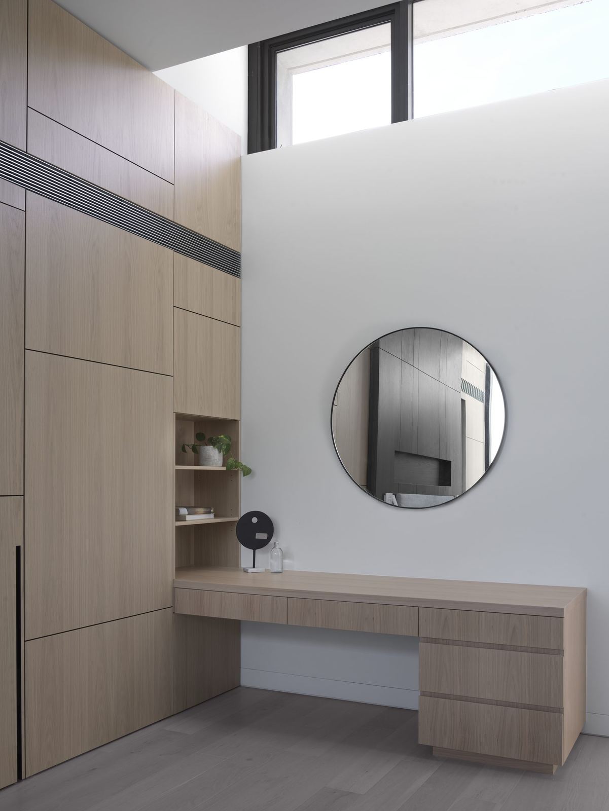 Castle Cove, dressing area with timber vanity, round mirror and skylight, built by HP Constructions with Dieppe Design