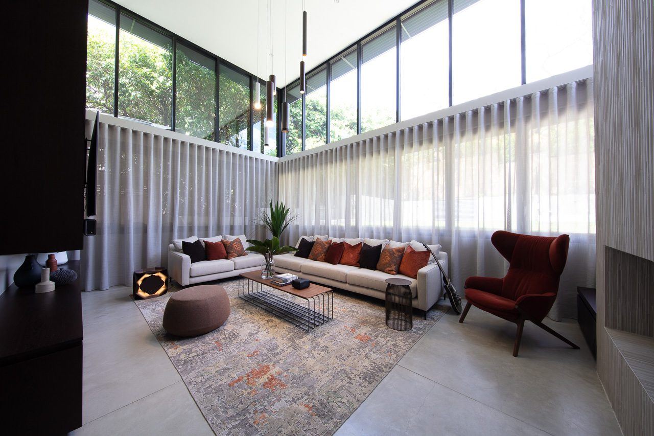 Hunters Hill, living room with floor-to-ceiling windows, sheer curtains and patterned rug, built by HP Constructions with Dale Design Group