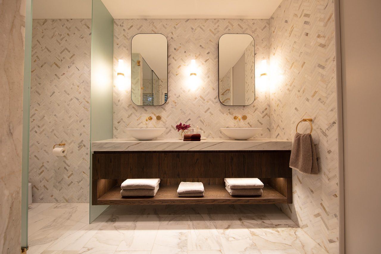 Hunters Hill, double vanity bathroom with twin mirrors and herringbone tiled wall, built by HP Constructions with Dale Design Group