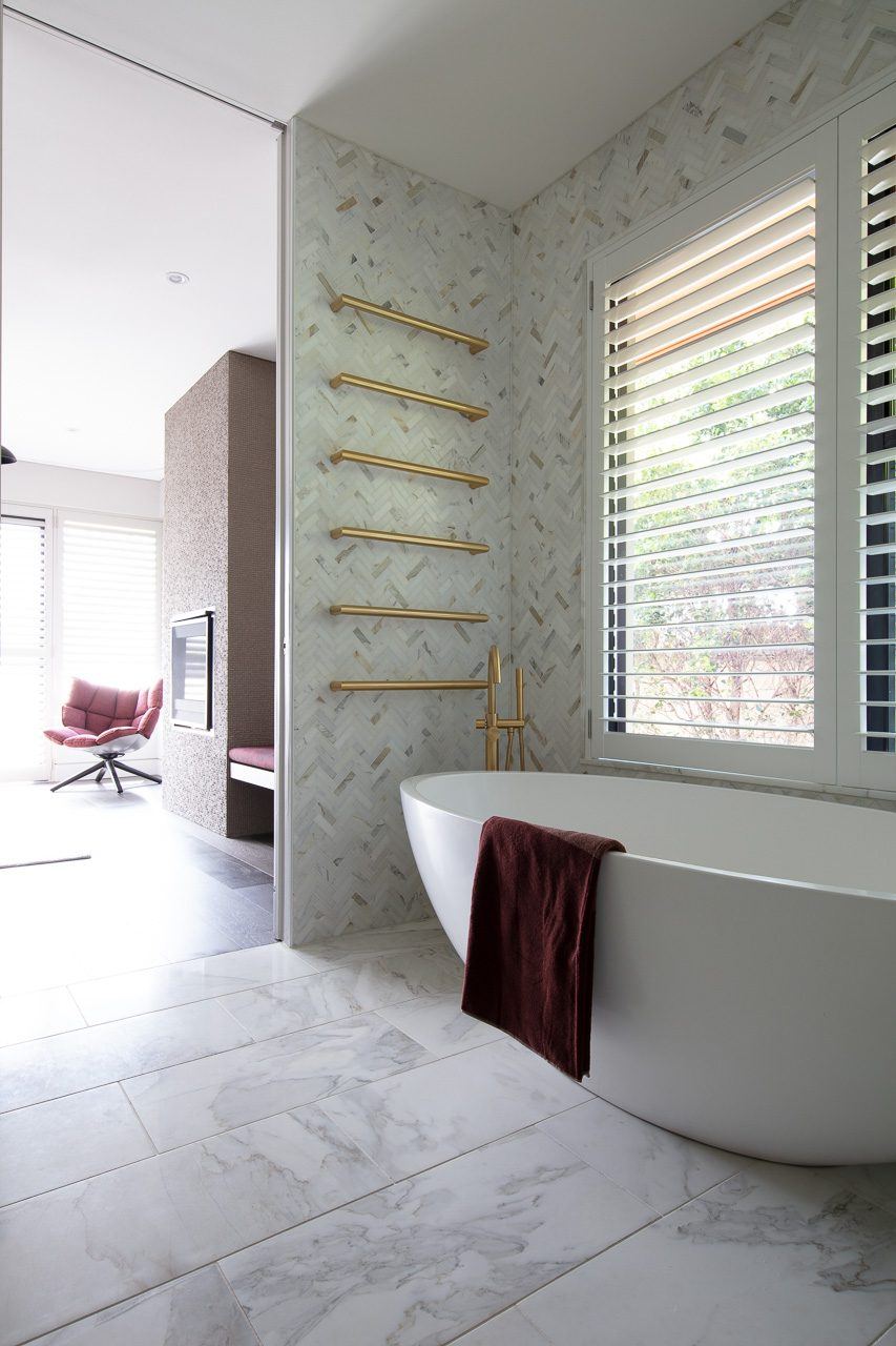 Hunters Hill, bathroom with freestanding bathtub, heated towel rail and shuttered window, built by HP Constructions with Dale Design Group