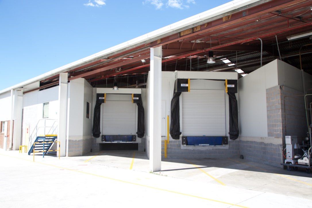 Kitchen Food Company, exterior loading docks with roller doors and dock levellers, built by HP Constructions