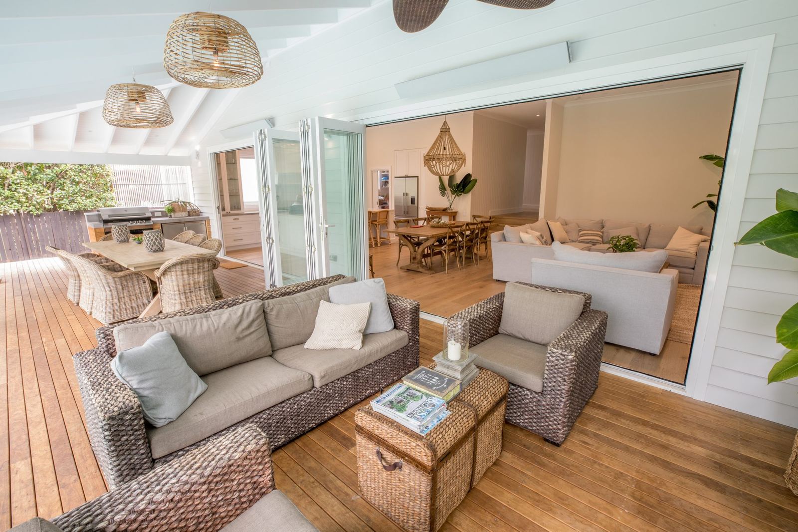 North Balgowlah, covered deck lounge with wicker sofas under vaulted ceiling, built by HP Constructions with J.D Evans & Co