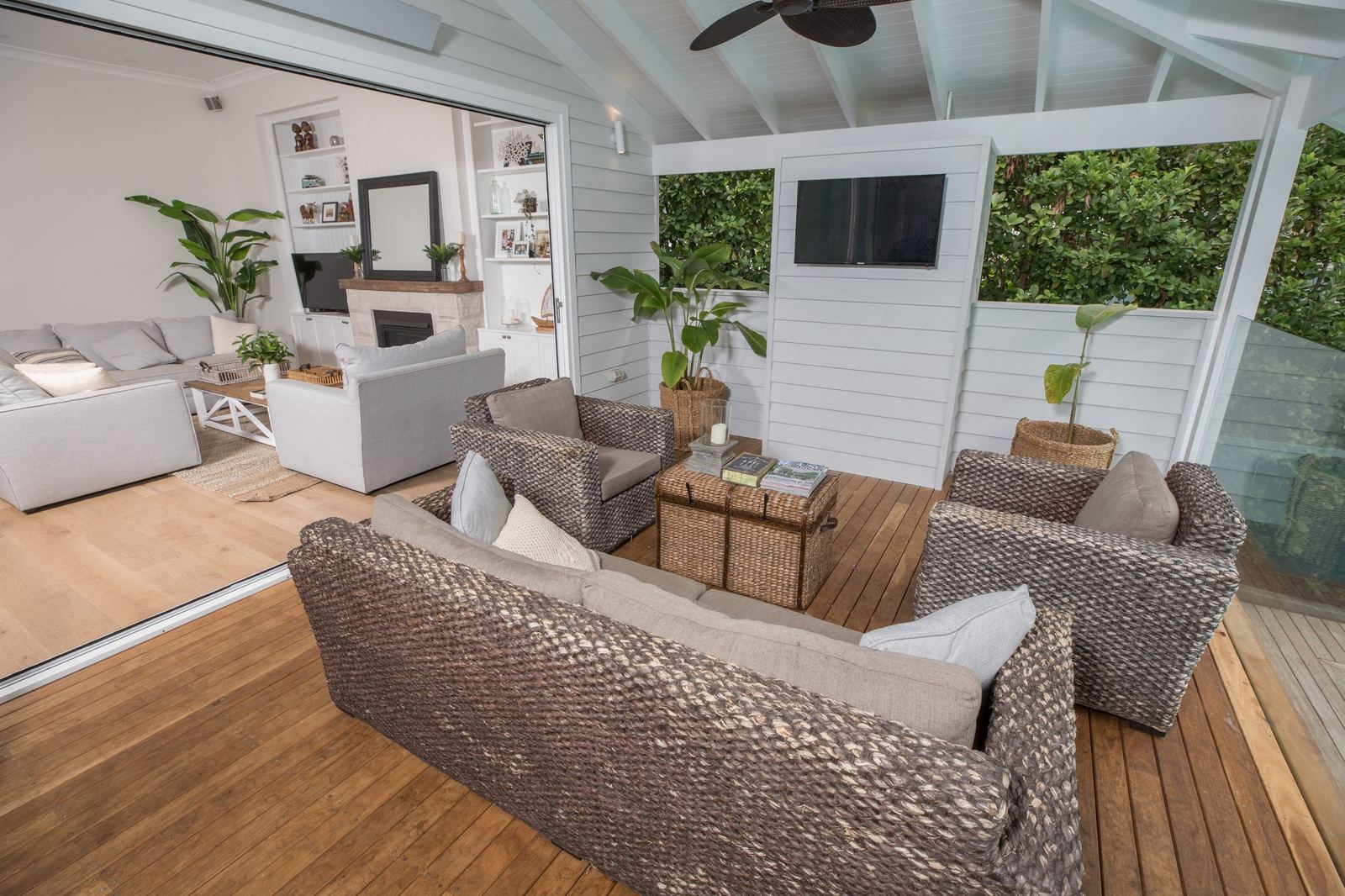 North Balgowlah, covered deck living area with wicker lounges and ceiling fan, built by HP Constructions with J.D Evans & Co