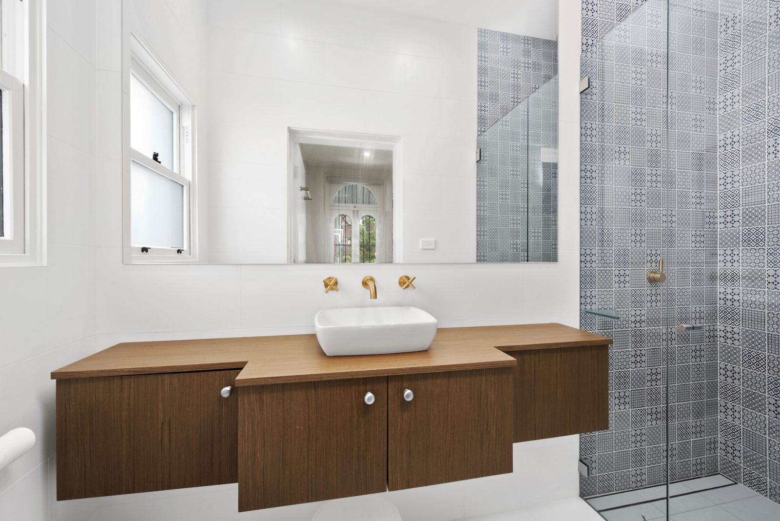 Paddington, bathroom with floating timber vanity, vessel basin and glass shower, built by HP Constructions with Gutnik Design Group