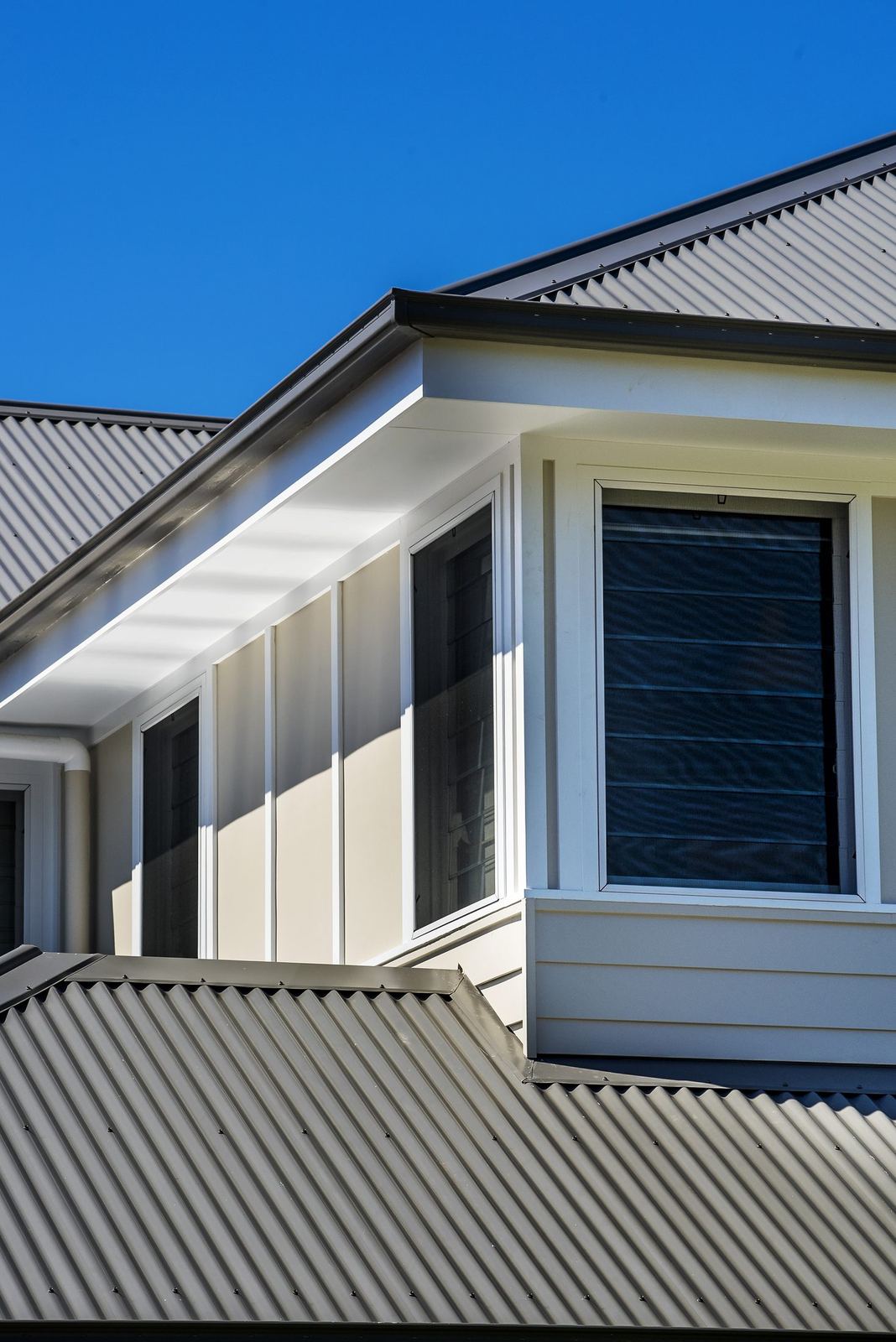 Seaforth, exterior roof detail with metal roofing and gabled weatherboard form, built by HP Constructions with Playoust Churcher