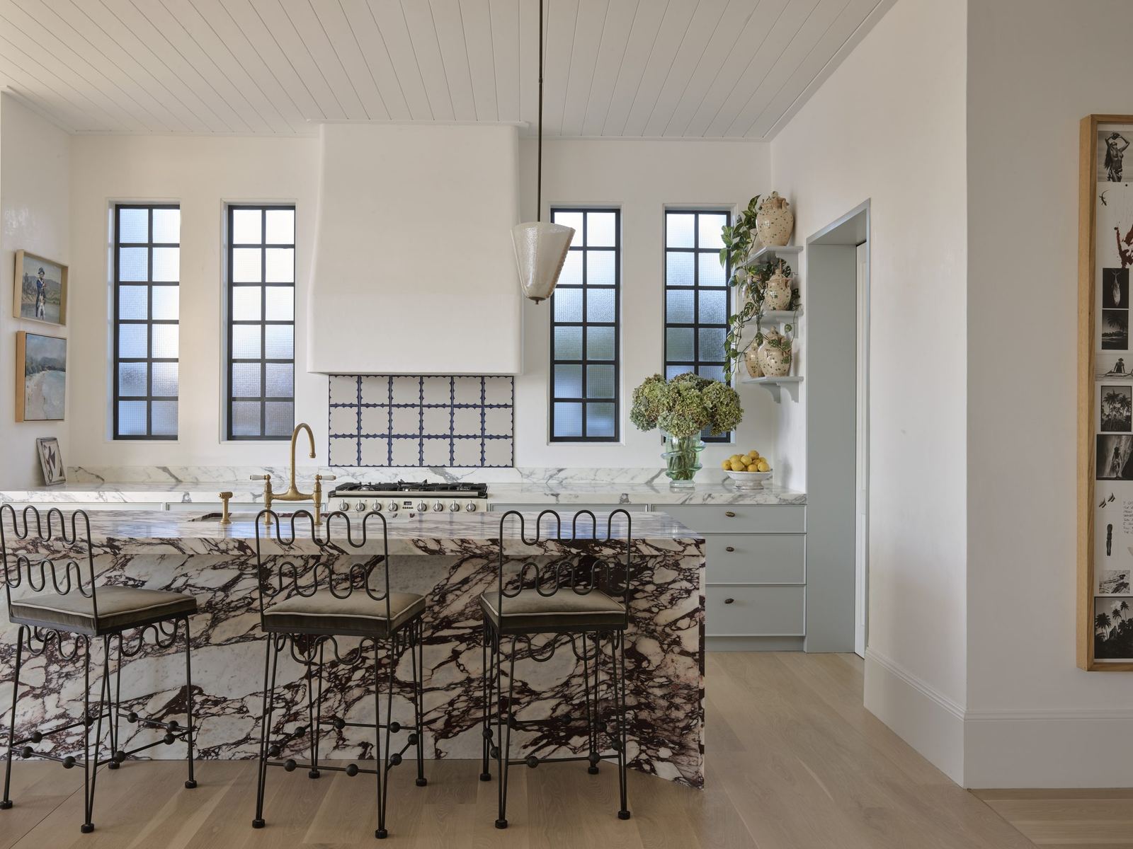 Vaucluse, kitchen with marble island, range hood and arched steel windows, built by HP Constructions with Alexander & Co