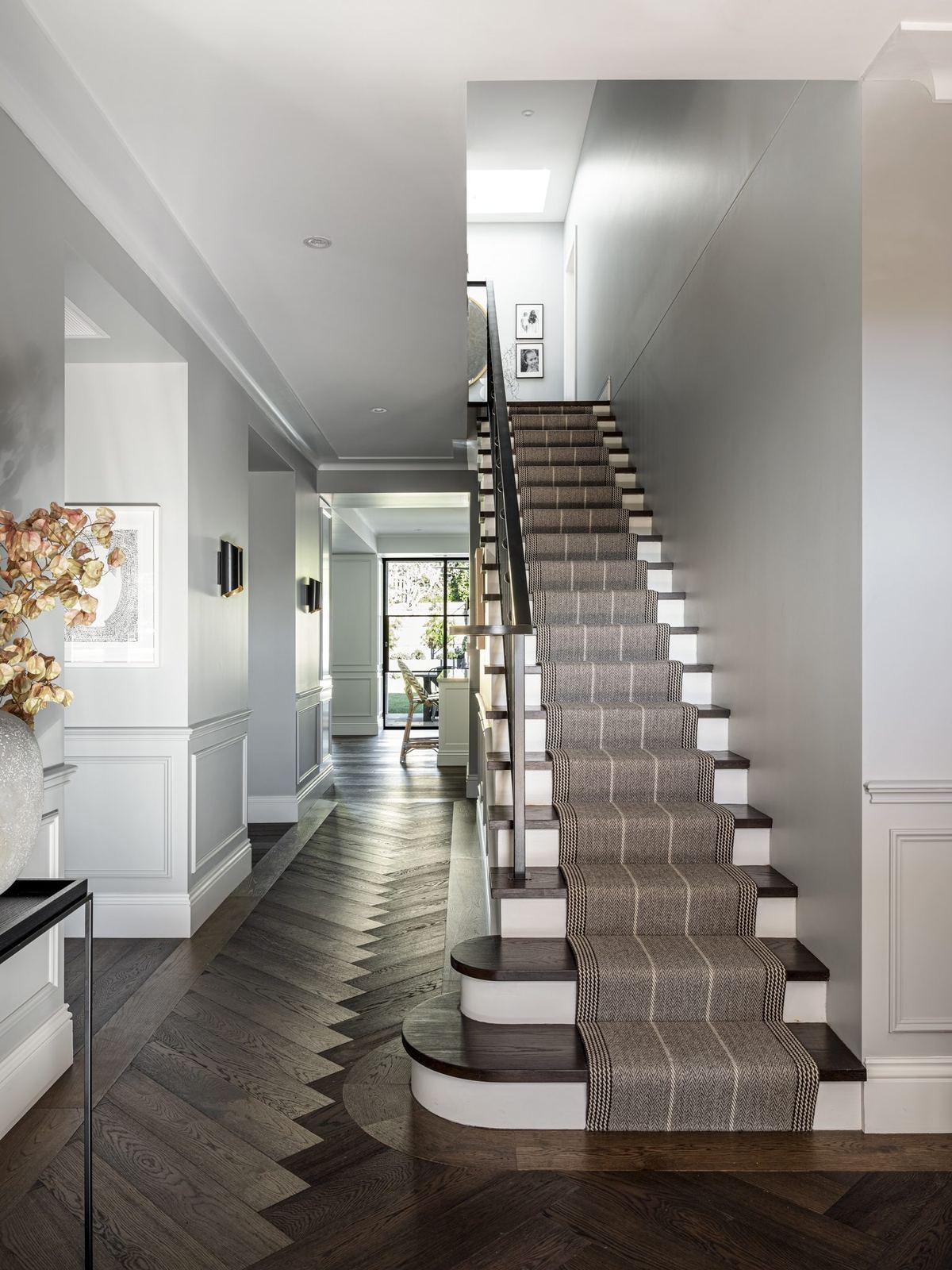 Willoughby, hallway with staircase, patterned runner and herringbone timber floor, built by HP Constructions with Alexander & Co